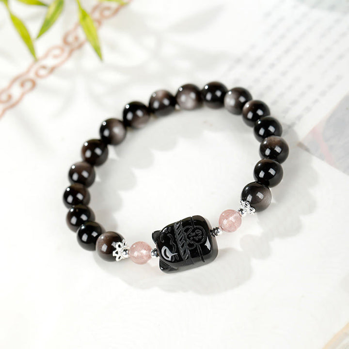 Buddha Stones Pulsera protectora de cuarzo fresa y obsidiana con brillo plateado de gato - image 1