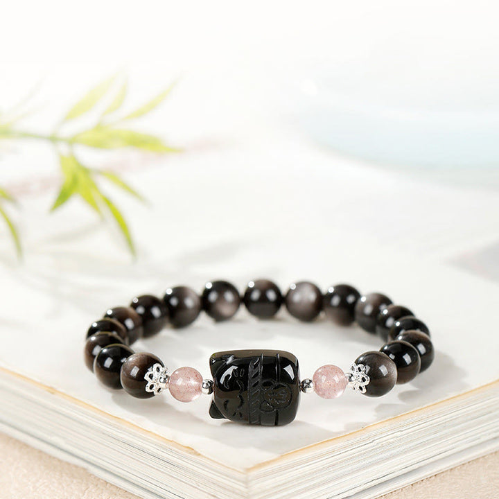 Buddha Stones Pulsera protectora de cuarzo fresa y obsidiana con brillo plateado de gato - image 2