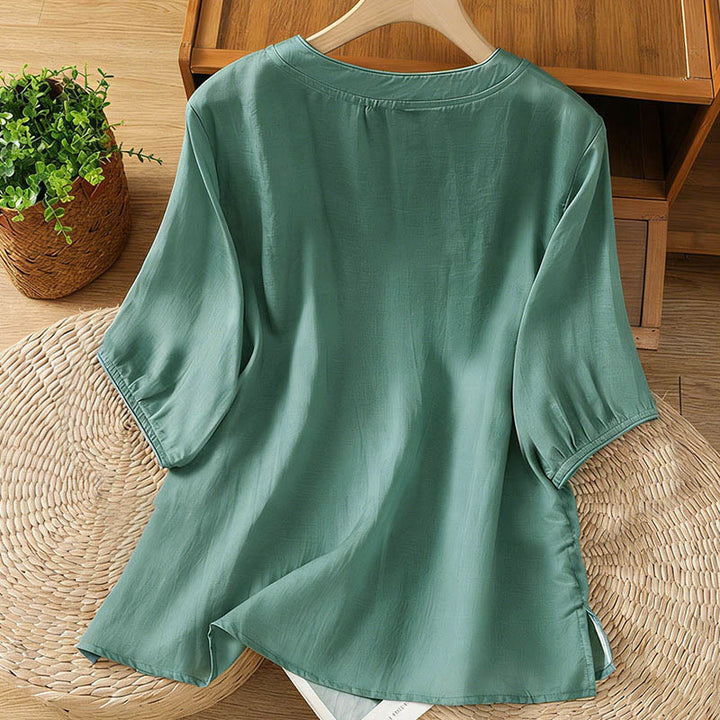 Camisa de mujer con cuello alto, botones de rana y flores bordadas, puños elásticos y manga tres cuartos con diseño de Buddha Stones - image 1