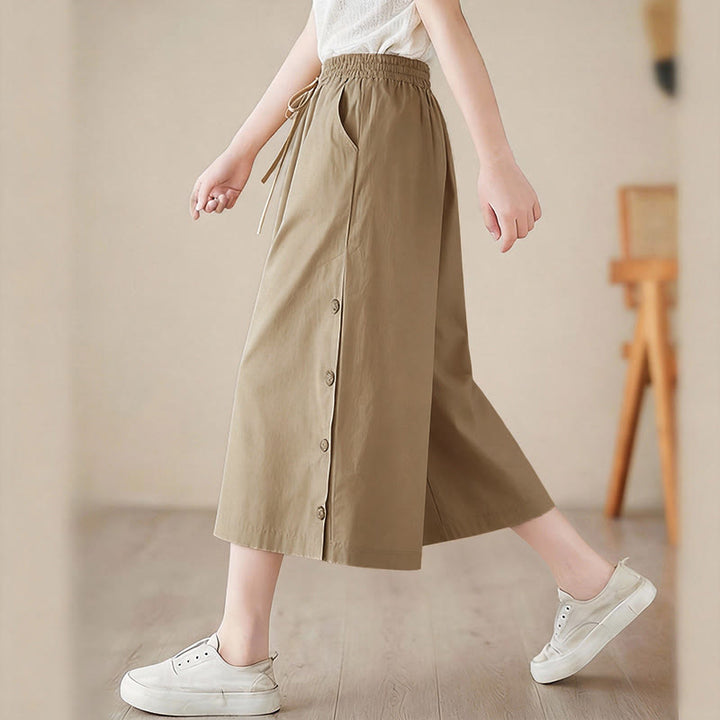 Buddha Stones Pantalones capri de pierna ancha para mujer con diseño abotonado lateral liso y bolsillos - image 17