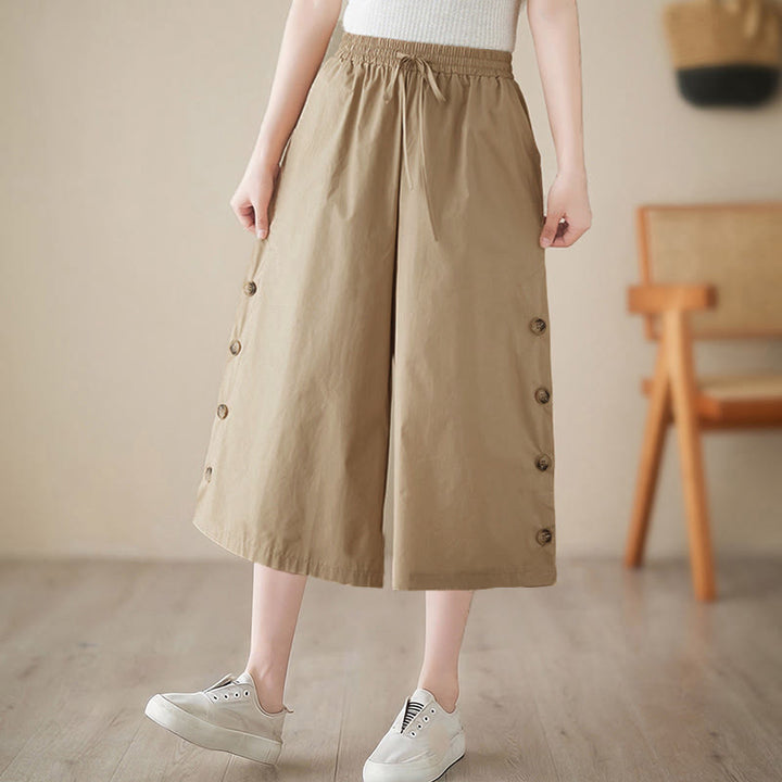 Buddha Stones Pantalones capri de pierna ancha para mujer con diseño abotonado lateral liso y bolsillos - image 15