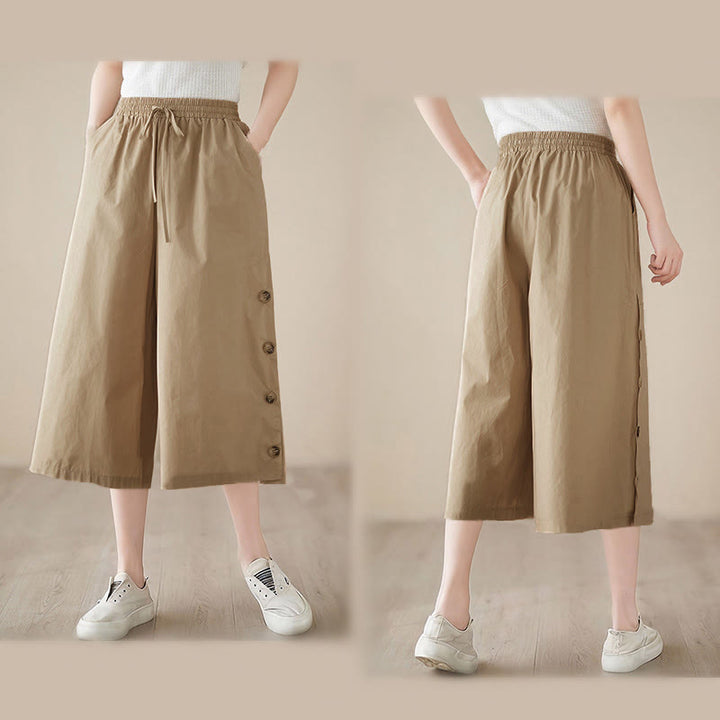 Buddha Stones Pantalones capri de pierna ancha para mujer con diseño abotonado lateral liso y bolsillos - image 21
