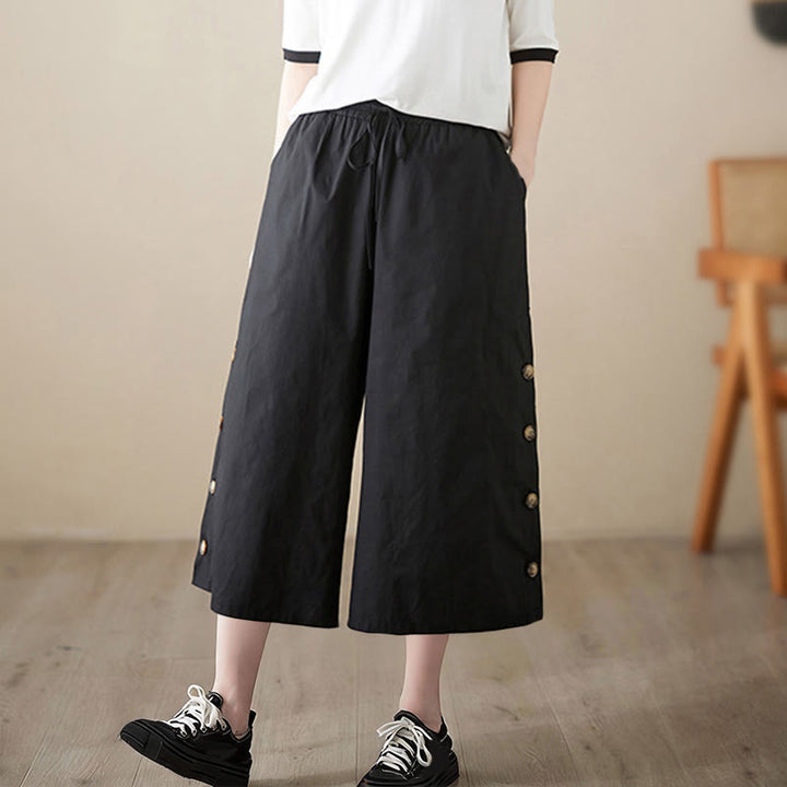 Buddha Stones Pantalones capri de pierna ancha para mujer con diseño abotonado lateral liso y bolsillos - image 7