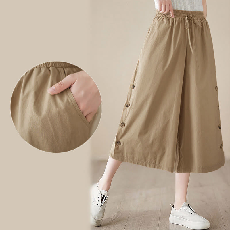 Buddha Stones Pantalones capri de pierna ancha para mujer con diseño abotonado lateral liso y bolsillos - image 19