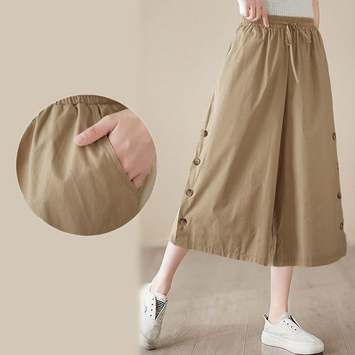 Buddha Stones Pantalones capri de pierna ancha para mujer con diseño abotonado lateral liso y bolsillos - image 19