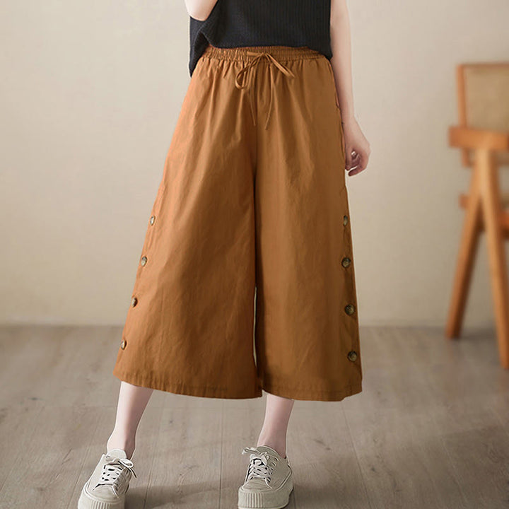 Buddha Stones Pantalones capri de pierna ancha para mujer con diseño abotonado lateral liso y bolsillos - image 3