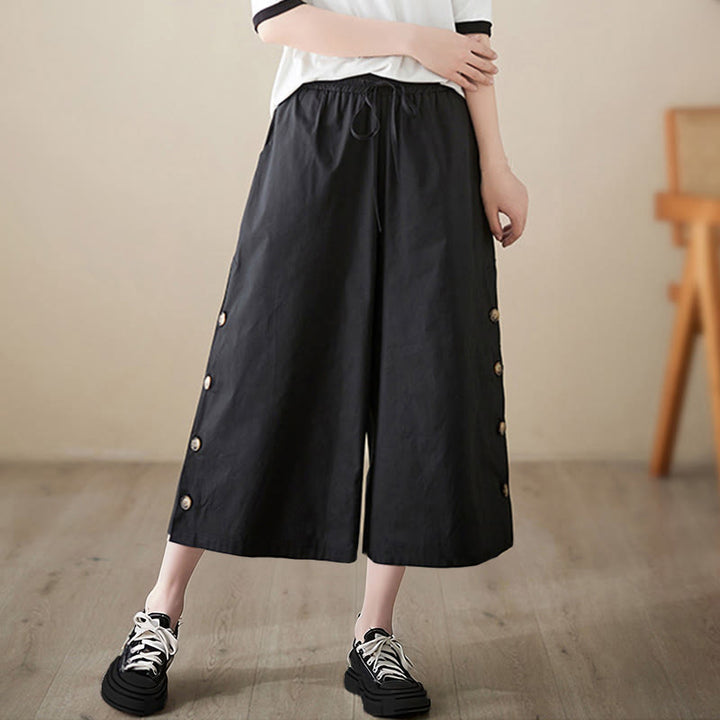 Buddha Stones Pantalones capri de pierna ancha para mujer con diseño abotonado lateral liso y bolsillos - image 6