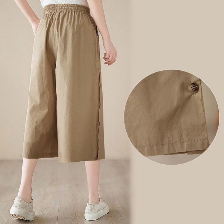 Buddha Stones Pantalones capri de pierna ancha para mujer con diseño abotonado lateral liso y bolsillos - image 20