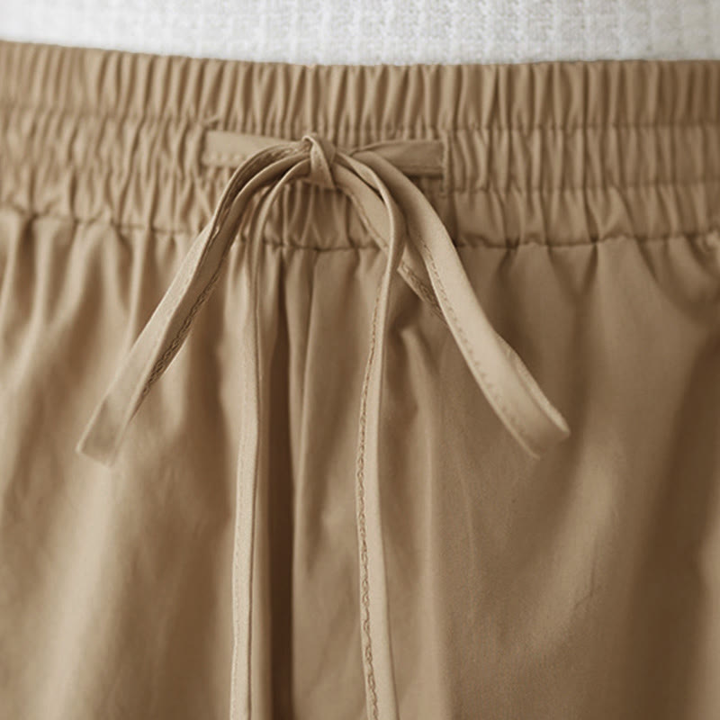 Buddha Stones Pantalones capri de pierna ancha para mujer con diseño abotonado lateral liso y bolsillos - image 22