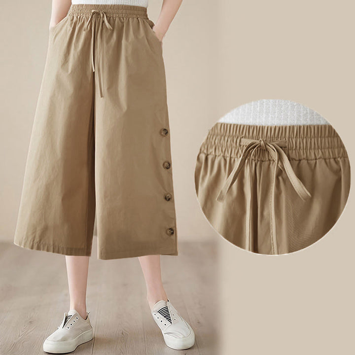 Buddha Stones Pantalones capri de pierna ancha para mujer con diseño abotonado lateral liso y bolsillos - image 18
