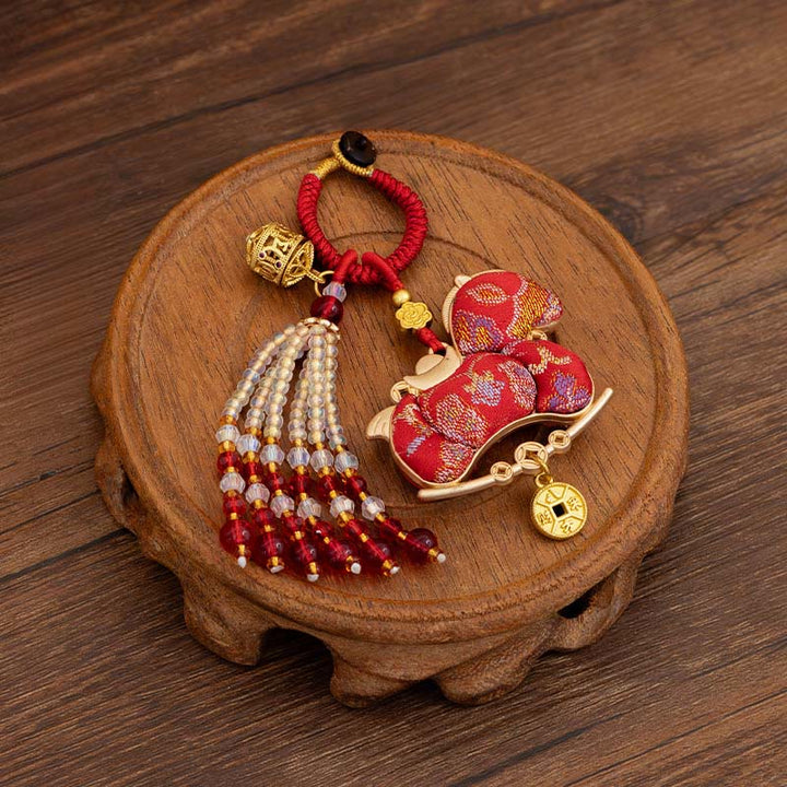 Buddha Stones Llavero de prosperidad con bordado del Año del Caballo - Caballo rojo (Tamaño: 10*5 cm) - image 0