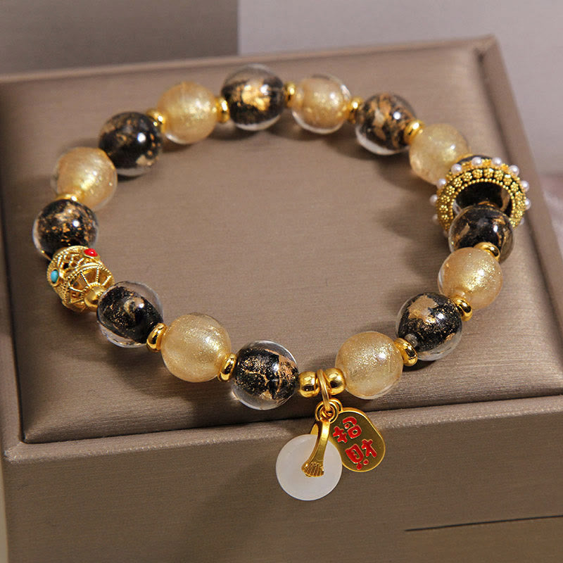 Buddha Stones Pulsera de bendición con hebilla de paz y cuentas de vidrio Liuli de oro negro que atrae la riqueza - image 1