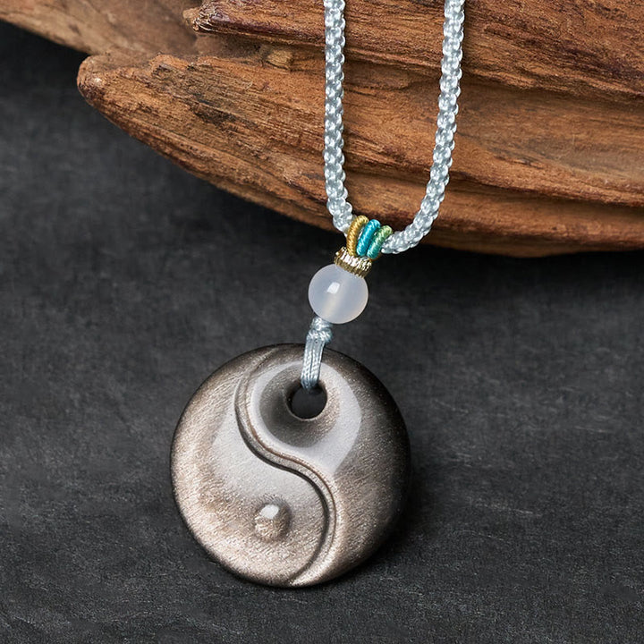 Buddha Stones Colgante de obsidiana plateada con símbolo Yin Yang y protección - image 1