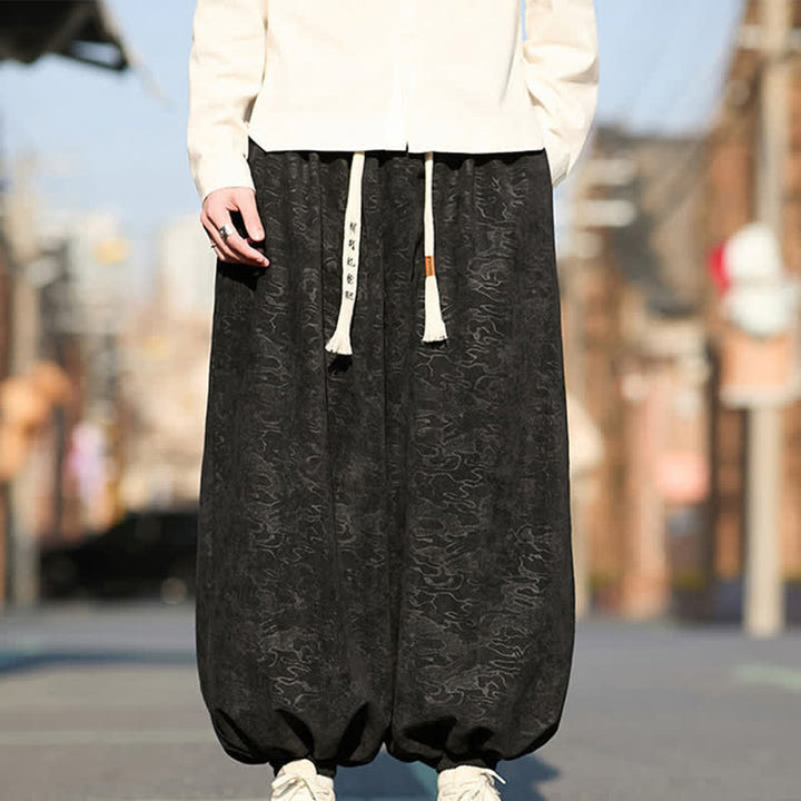 Buddha Stones Pantalones harem para hombre de jacquard negro con cordón ajustable, puños elásticos y bolsillos. - image 0