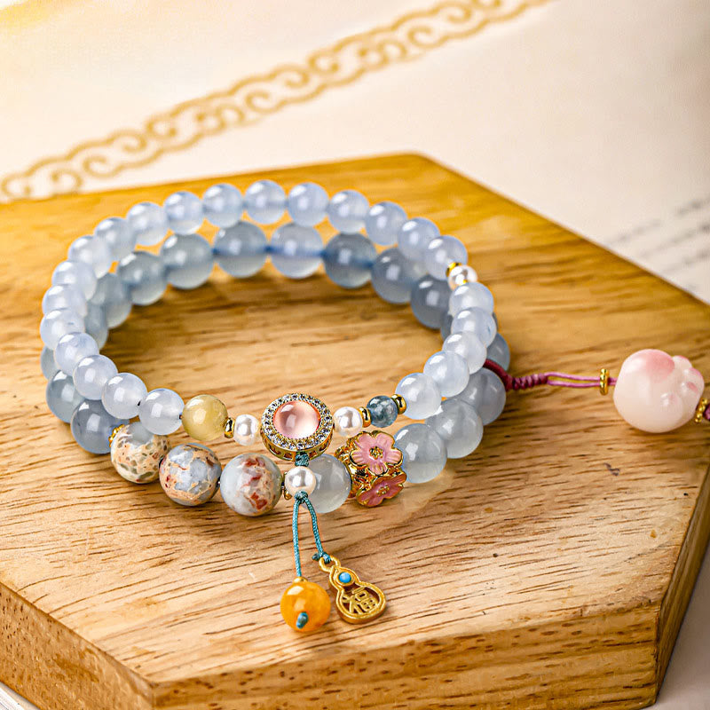 Buddha Stones Pulsera curativa con forma de pata de gato y calcedonia azul Fu - Huella de gato (circunferencia de la muñeca: 14-15 cm) - image 0
