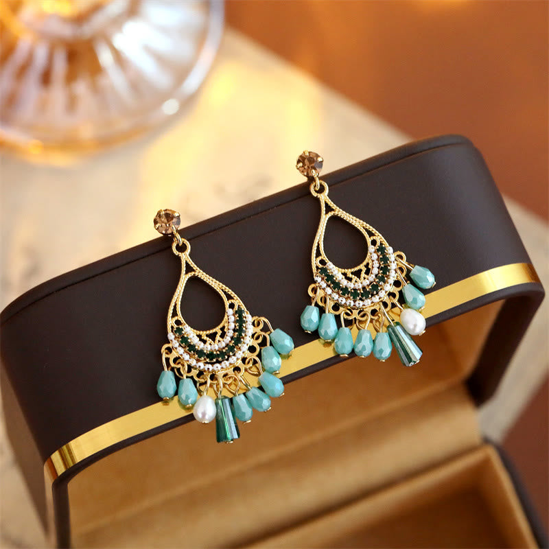 Buddha Stones Pendientes colgantes calados de cobre con borla en forma de lágrima para el autocuidado - image 1