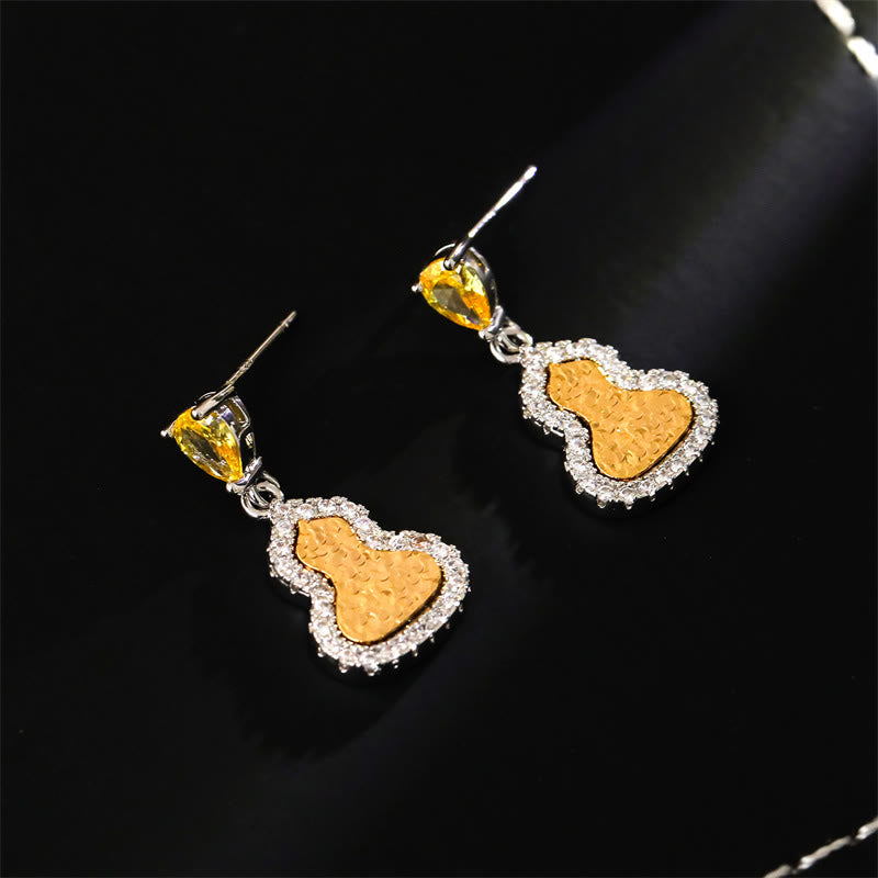 Buddha Stones Pendientes de cobre con circonita y forma de calabaza dorada, símbolo de riqueza. - image 1