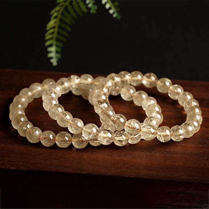 Pulsera de protección de auspiciosidad de cuarzo rutilado natural con Buddha Stones - image 4