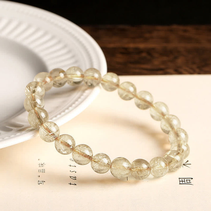Pulsera de protección de auspiciosidad de cuarzo rutilado natural con Buddha Stones - image 2