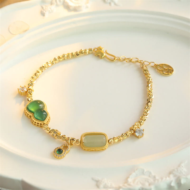 Buddha Stones Pulsera con cadena de soporte de cuentas de cobre, ágata verde calabaza y circonita - image 1
