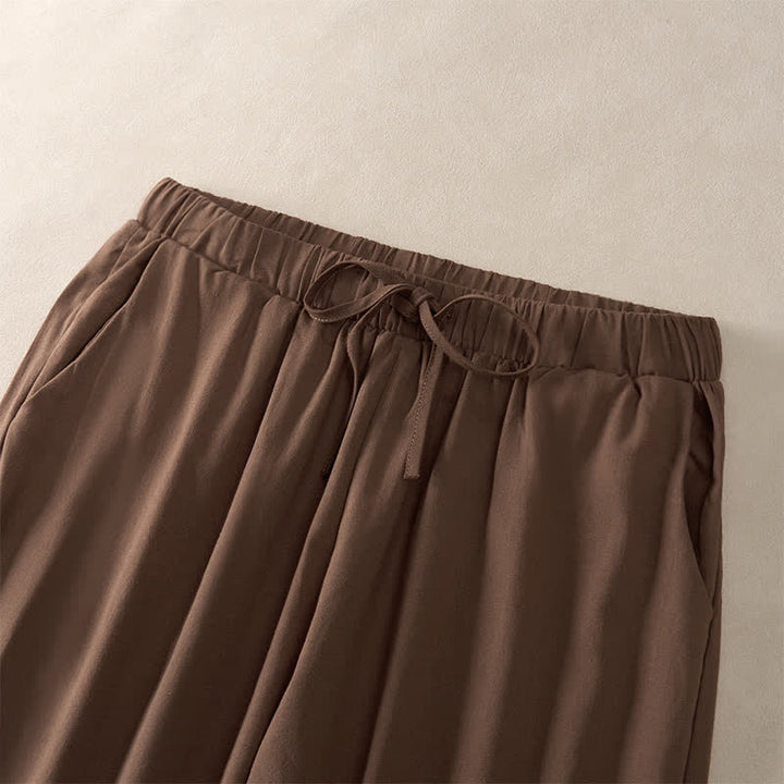 Buddha Stones Pantalones de mujer de color liso, corte ajustado, con dobladillo ribeteado con encaje y bolsillos, ideales para el verano. - image 1