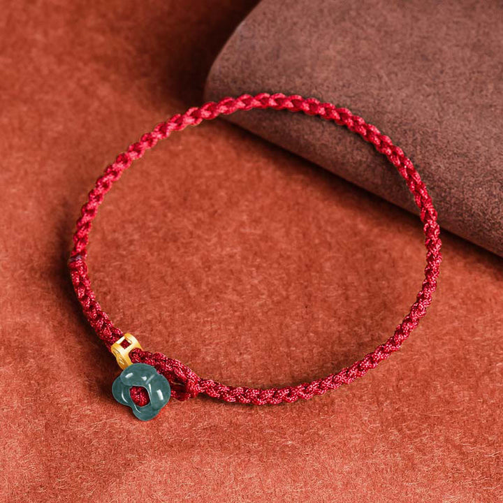 Buddha Stones Pulsera de hilo rojo con moneda de cobre y flor de jade de la suerte - image 1