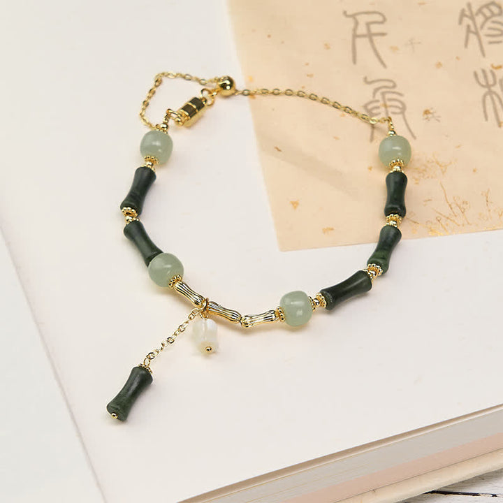 Buddha Stones Pulsera ajustable de jade hetian, peridoto, bambú y lirio del valle, símbolo de riqueza y fidelidad. - Peridoto (circunferencia de la muñeca: 15-18 cm) - image 0
