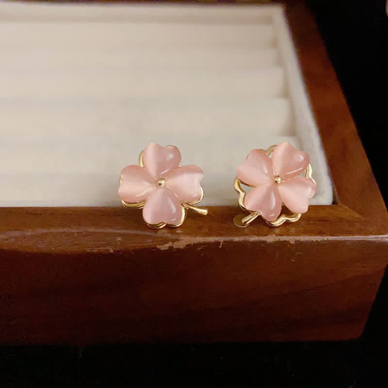 Buddha Stones Pendientes de botón giratorios con diseño de flor de cuatro hojas rosa ojo de gato. - image 1