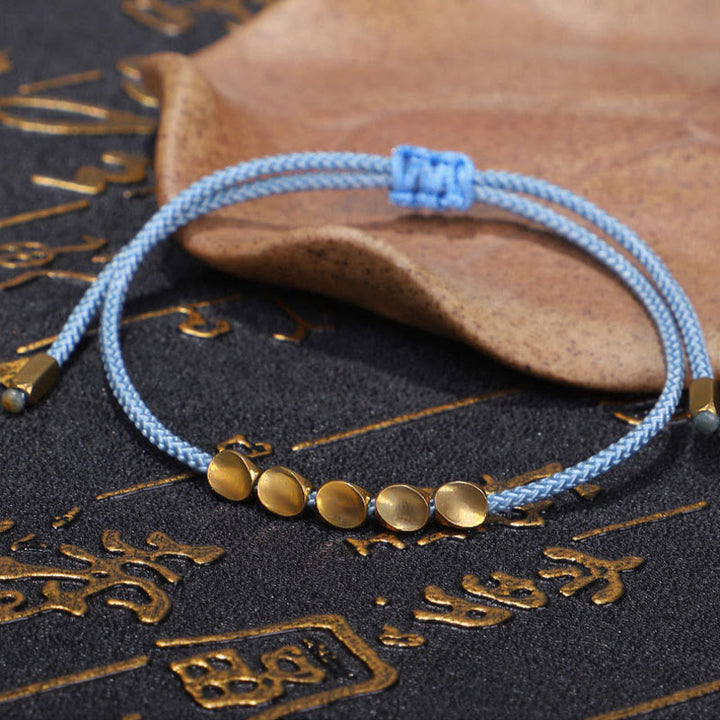 Buddha Stones Pulsera curativa de 3 piezas con cuentas de cobre dorado y hilo azul y amarillo. - image 4