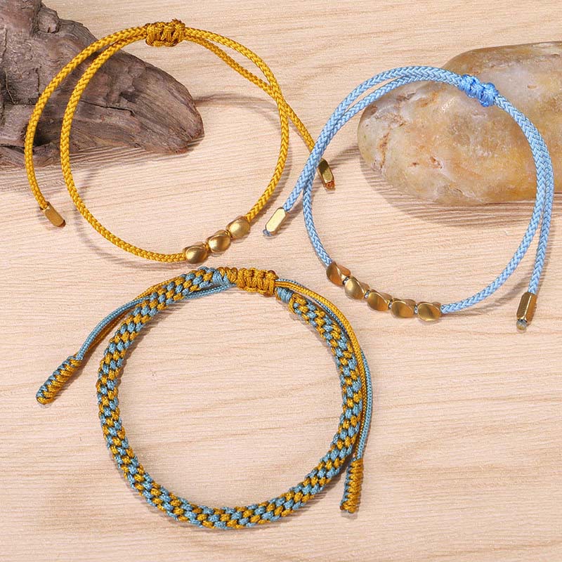 Buddha Stones Pulsera curativa de 3 piezas con cuentas de cobre dorado y hilo azul y amarillo. - image 8