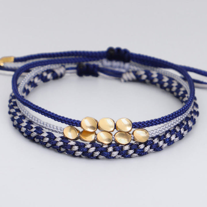 Buddha Stones Pulsera de 3 piezas con cuentas de cobre dorado y cordón azul grisáceo para el autocuidado - Cuerda (circunferencia de la muñeca: 16-26 cm) - image 0