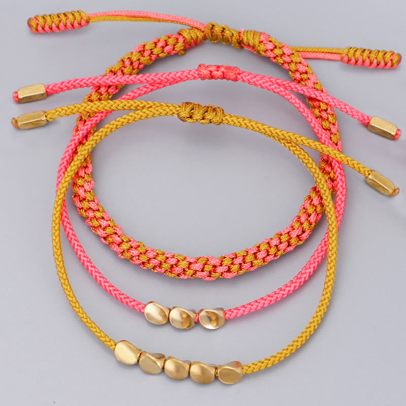 Buddha Stones Pulsera de la riqueza de 3 piezas con cuentas de cobre dorado y rosa y hilo amarillo. - image 2