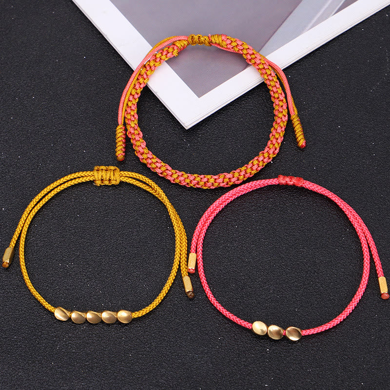 Buddha Stones Pulsera de la riqueza de 3 piezas con cuentas de cobre dorado y rosa y hilo amarillo. - image 9