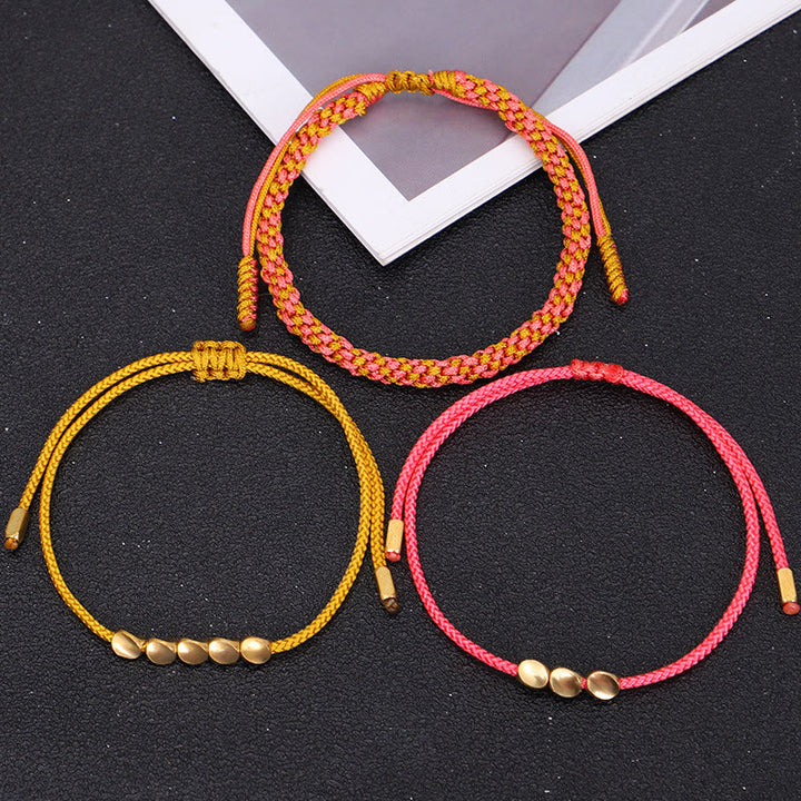 Buddha Stones Pulsera de la riqueza de 3 piezas con cuentas de cobre dorado y rosa y hilo amarillo. - image 9