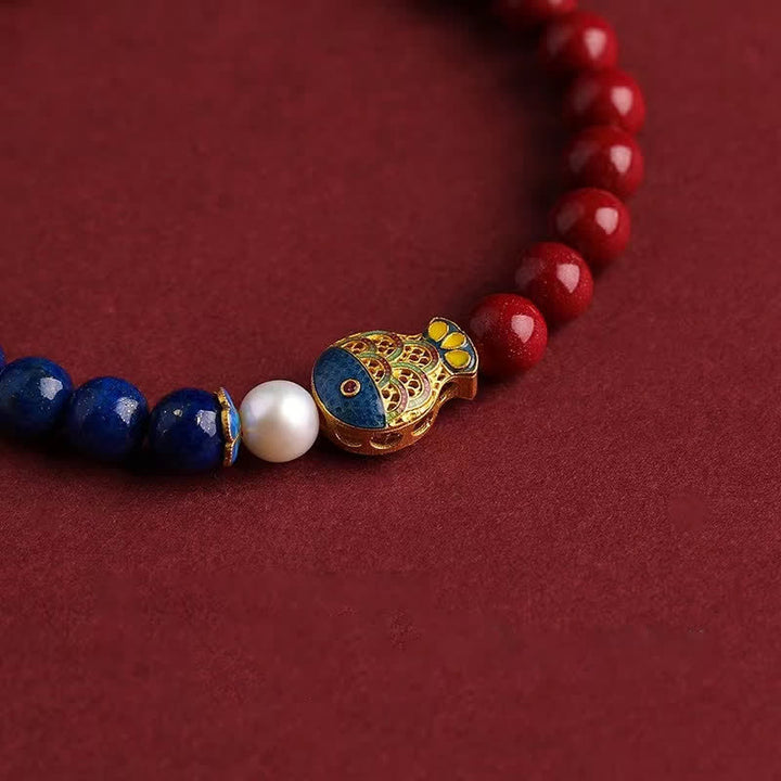Buddha Stones Pulsera de cuentas con dije de nube Ruyi, pez koi y lapislázuli cinabrio - image 1