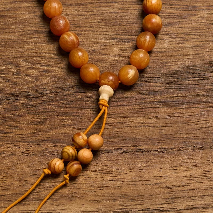 Buddha Stones Mala de 108 cuentas de madera de pino rica en resina para una energía calmante - image 3