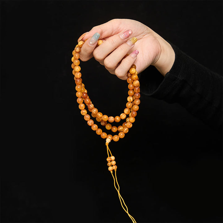 Buddha Stones Mala de 108 cuentas de madera de pino rica en resina para una energía calmante - image 4