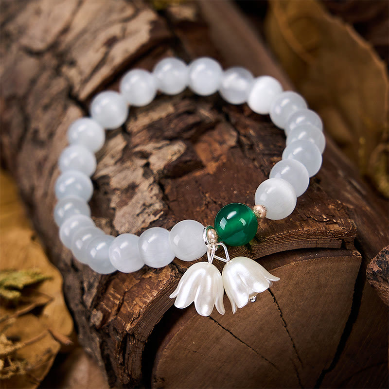 Buddha Stones Pulsera con cuentas redondas blancas de ojo de gato de 8 mm y flores de lirio del valle. - image 4