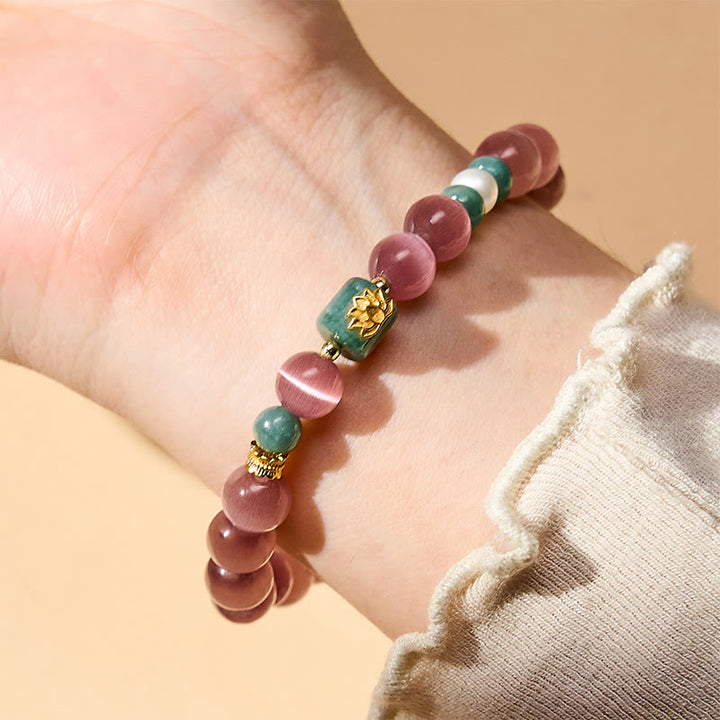 Buddha Stones Pulsera con símbolo de iluminación de loto ojo de gato morado - image 2