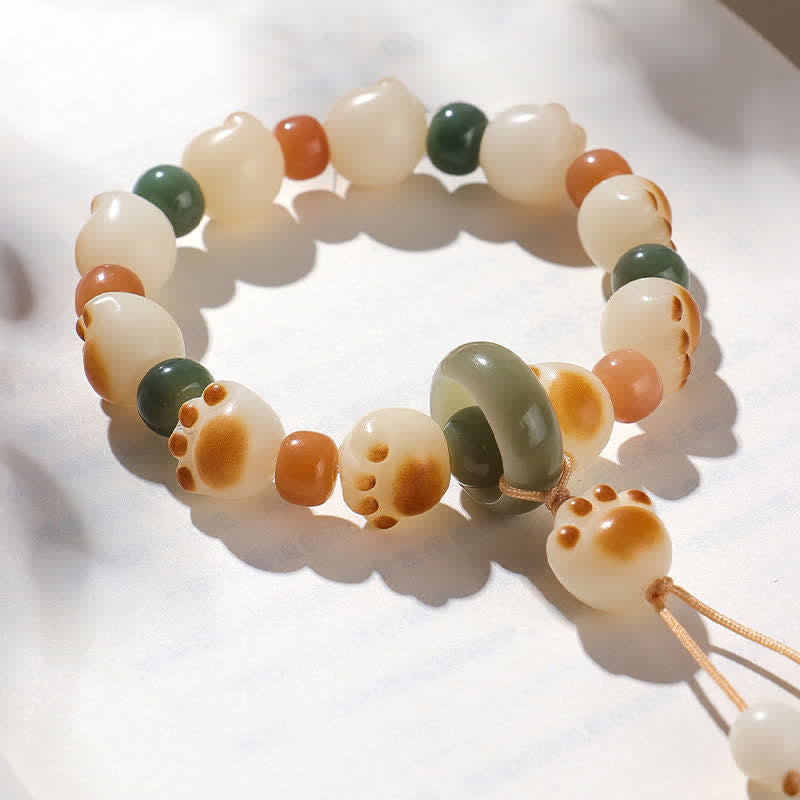 Buddha Stones Pulsera de la riqueza con diseño de huella de gato y semillas de Bodhi naturales - image 1