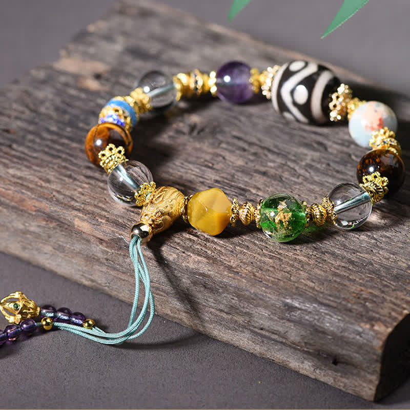 Buddha Stones Pulsera de salud con cuentas Dzi naturales de amatista y ojo de tigre - image 2