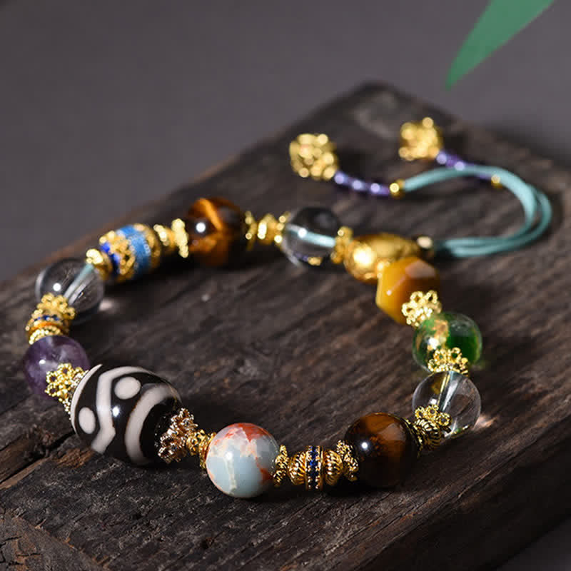 Buddha Stones Pulsera de salud con cuentas Dzi naturales de amatista y ojo de tigre - image 1