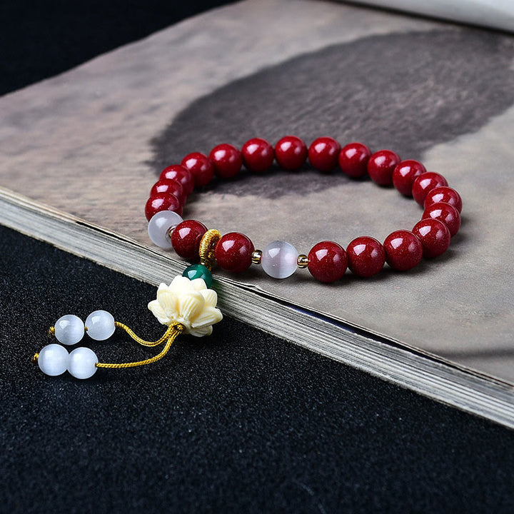 Buddha Stones Pulsera con dije de loto de marfil ojo de gato de cinabrio natural y bendición - image 2