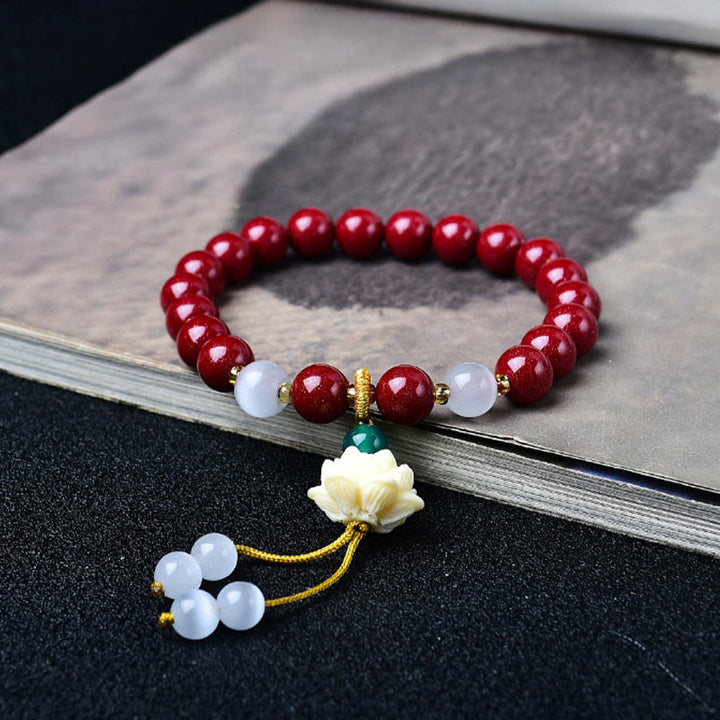 Buddha Stones Pulsera con dije de loto de marfil ojo de gato de cinabrio natural y bendición - Cinabrio de 8 mm (circunferencia de la muñeca: 15-16 cm) - image 0