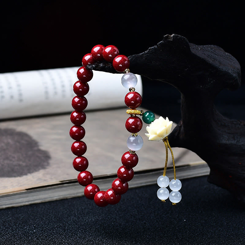 Buddha Stones Pulsera con dije de loto de marfil ojo de gato de cinabrio natural y bendición - image 1