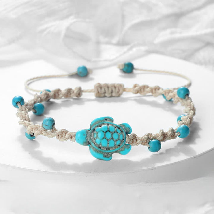 Buddha Stones Pulsera protectora de cuerda trenzada con diseño de tortuga turquesa - image 1