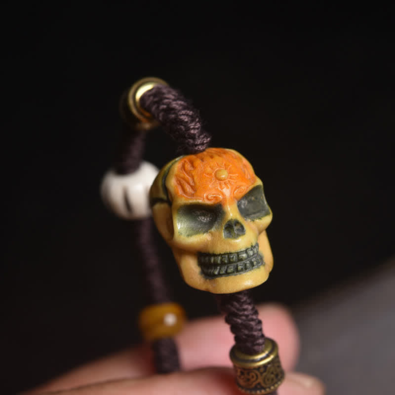 Buddha Stones Pulsera de cuerda trenzada con diseño de Bone, el Señor del Bosque de los Cadáveres, para alejar a los espíritus malignos. - image 1