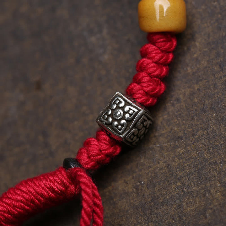Buddha Stones Pulsera de serenidad de cuerda trenzada con Buda Amitabha de cobre - image 1