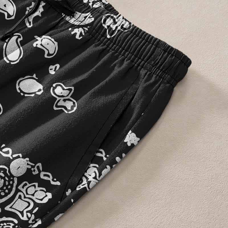 Buddha Stones Pantalones de hombre de algodón con estampado de patchwork paisley en blanco y negro, corte ajustado y bolsillos. - image 2