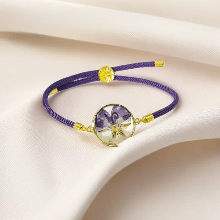 Buddha Stones Pulsera ajustable de cuerda trenzada con flor de nacimiento hecha a mano con resina - Violeta (circunferencia de la muñeca: 17–22 cm) - image 0
